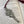 Load image into Gallery viewer, Oscar Wilde bookmark. A maroon tassel attached. MADE OF PEWTER METAL IN SILVER FINISH . Handmade in Ireland.