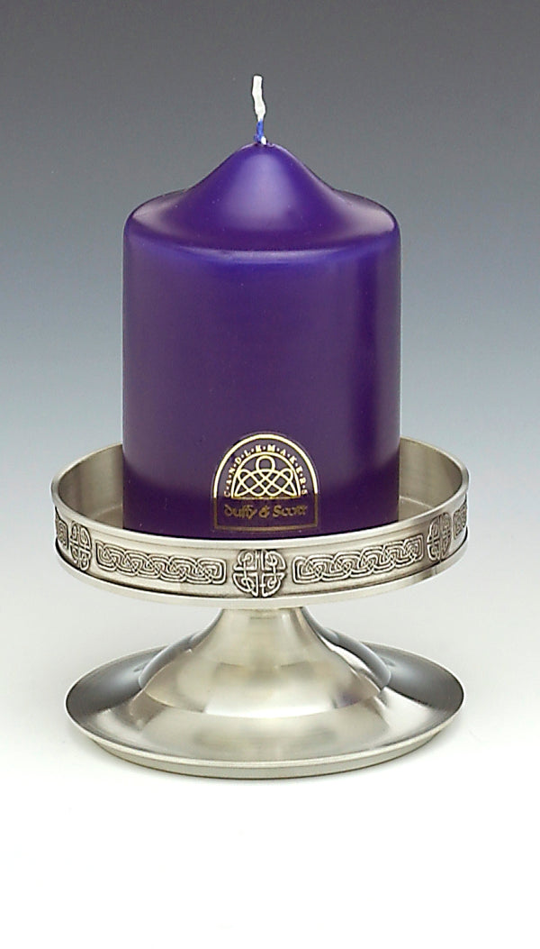 IRISH PEWTER STEM CANDLE HOLDER CELTIC KNOT. The candle holder is 5" wide and stands 2 1/2" high. Great for the larger candles and great as an engagement gift. Handmade in Ireland by Mullingar Pewter