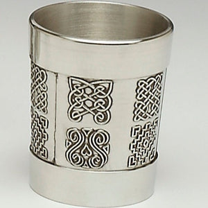 2 OZ CELTIC SHOT. PERFECT TO MEASURE YOUR WHISKEY AND BEAUTIFULLY DECORATED WITH CELTIC DESIGN FROM THE BEALIN CROSS. PEWTER METAL WITH SILVER BANDS MADE IN IRELAND.