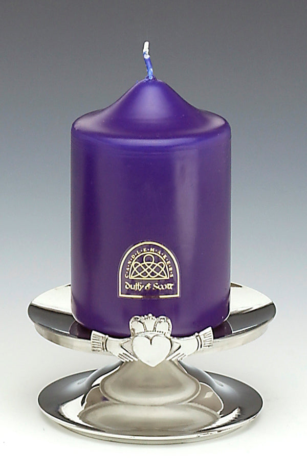 IRISH PEWTER STEM CANDLE HOLDER CLADDAGH. This 5" wide candle holder is perfect for that big candle. The holder has the Claddagh fixed to its side and stands 2 1/2" tall. Great house warming gift. Made in Ireland by Mullingar Pewter.