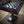 Load image into Gallery viewer, Brian Boru Theme chess set made from Mullingar Pewter and presented on a handcarved Mahogany Chess table with Pewter metal inlay