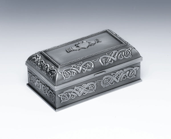 tHIS 5" JEWELRY BOX IS SURROUNDED WITH CELTIC DESIGN ON THE LID AND BOX. THE LID HAS THE CLADDAGH SYMBOL ON THE TOP AND  HAS ROOM FOR ENGRAVING. THE BOX IS POLISHED TO A P-EWTER SILVERWARE FINISH WITH A CONTRASTING DARKER BACKGROUND. GREAT AS A BRIDES MAID GIFT FOR ANY WEDDING PARTY.