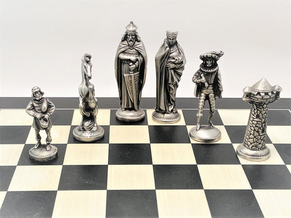 MEDIEVAL CHESS SET. the figures are pewter and have a dark side and a silver finished side. A great gift for birthday, fathers day, anniversary, home coming, new home or chess enthusiast. The board is 14" square. PEWTER  SILVER FINISH.
