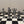 Load image into Gallery viewer, MYTHICAL IRISH CHESS SET. THIS CHESS SET TELLS THE STORY OF THE TUATHA DE DANANN A MYTHICAL IRISH RACE THAT EXISTED BEFORE THE DRUIDS. THEY WERE REVERED AS A MAGICAL RACE. THE CHESS BOARD IS 14" SQUARE IN SIZE AND THE PIECES ARE 3 1/2" TALL TO 2 1/2" TALL.. PEWTER PIECES AND A TIMBER BOARD.
