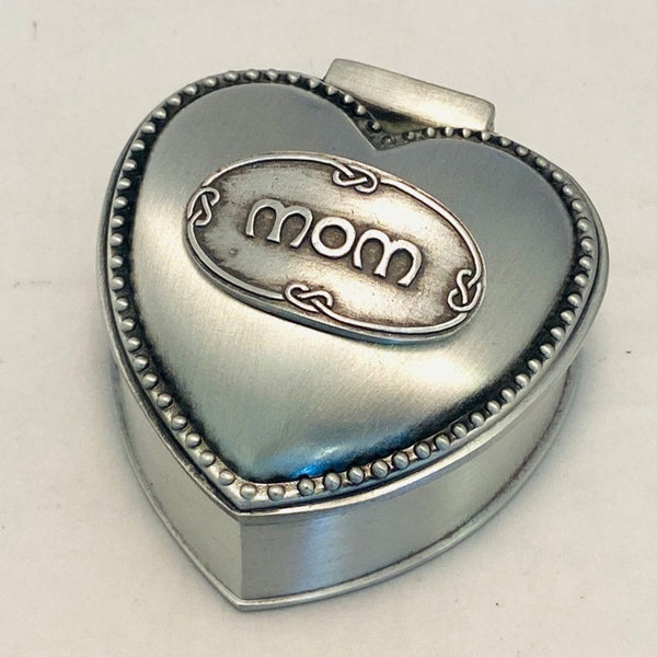 THIS IS THE IDEAL LITTLE JEWELLERY BOX  TO HOLD THOSE SMALL ITEMS THAT MOM'S TREASURE SO MUCH. THE PEWTER HAS A SOFT SILVER SHEEN AND THE BOX IS SURROUNDED WITH BEEDING AND A CELTIC LACE AROUND THE MOM ON THE LID. PEWTER SILVERWARE SOFT SHEEN FINISH
