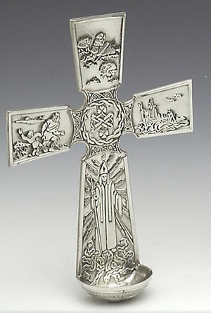ST.PATRICK HOLY WATER FONT. The Cross tells the story of St. Patrick in Ireland. The pewter Wall Font is 8" long and hangs easily from the secure hanger at the rear. Great Irish family gift or gift for a priest.  Handmade in Ireland.