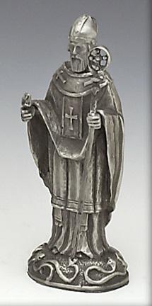 ST.PATRICK statue 6" tall is a solid piece. The statue is a replica of  so many  statues of St. Patrick c that can be found throughout Ireland. the snakes at his feet, the crosier in his left hand and the shamrock in his right hand. Handmade in Ireland by Mullingar Pewter