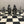 Load image into Gallery viewer, CHESS SET OF VIKING FIGURES. This set replicates the Viking s that invaded Ireland in the 8th and 9th centuries. the king stands at 3 3/4" high and the pawn is 2 1/2" tall. the board is 14" square. Handmade in Ireland by Mullingar Pewter.