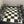 Load image into Gallery viewer, CHESS SET OF VIKING FIGURES. the vikings invaded Ireland during the 8th and 9th centuries and were finally defeated in 1014 at the battle of Clontarf by Brian Boru, High King of Ireland. The king is 3 3/4" tall and the pawn is 2 1/2" tall. The board is 14" square. Handmade in Ireland, by Mullingar Pewter