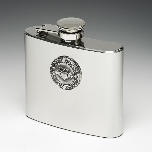 5OZ WHISKEY FLASK With the Claddagh design. The flask is hip shaped and 3" tall. The cap is a safety cap so no fear of loosing it. Great Fathersday gift. Made in Ireland by Mullingar Pewter