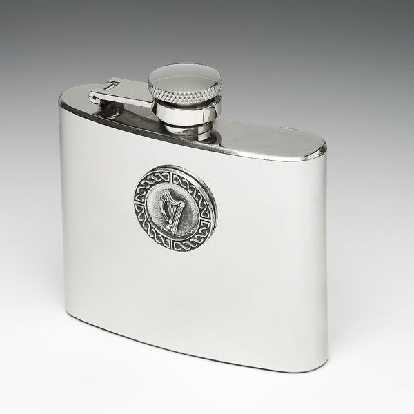 5OZ WHISKEY FLASK made of stainless steel. the flask is 3" tall and hip shaped. Great as a mans gift for those cold winter football games. The design is that of the Irish Harp. Made in Ireland by Mullingar Pewter