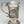 Load image into Gallery viewer, THE MEASURE IS MADE OF CAST PEWTER. THE DECORATION IS OF HARE IN WILDLIFE SCENES IN A WOODLAND SETTING. THE MEASURE IS 2" TALL AND HOLDS 1 FLUID OZ. HANDMADE IN IRELAND BY MULLINGAR PEWTER.