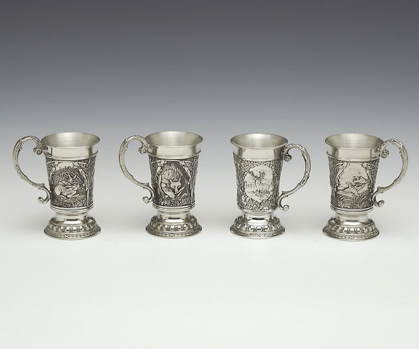 WOODLANDS SHOT MEASURES WITH HANDLES. AVAILABLE IN FOUR DIFFERENT PATTERNS. THE SCENES ARE WILDLIFE SCENES OF STAG, FOX, DUCK AND HARE. EACH MEASURE IS 2" TALL AND HOLDS 1 FLUID OZ. HANDMADE IN IRELAND BY MULLINGAR PEWTER