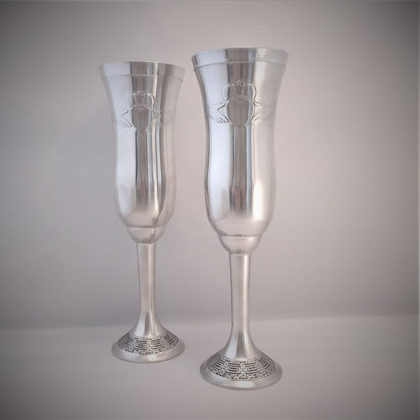 pair of Mullingar pewter Champagne flutes with claddagh motif