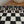 Load image into Gallery viewer, Battle of the Boyle Pewter Chess set on wooden board
