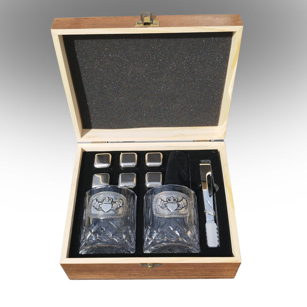 Cut crystal whiskey glasses with Claddagh pewter design, ice cubes and  tong