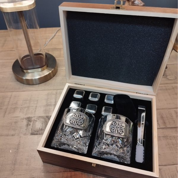 Cut crystal whiskey glasses with a trinity pewter emblem, cubes and a tong