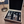 Load image into Gallery viewer, Whiskey glass set with pewter trinity design with ice cubes and a tongs

