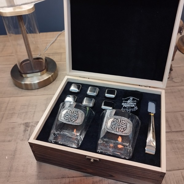 Whiskey glass set with pewter trinity design with ice cubes and a tongs