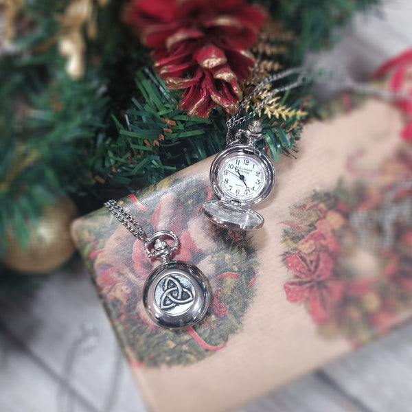 Silver coloured pewter ladies necklaces with clock.