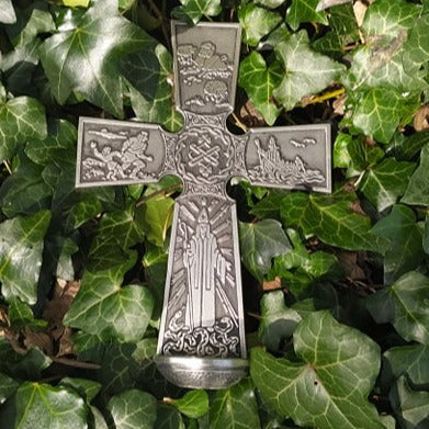 St. Patricks water Font made from Mullingar Pewter a Silver metal. This photo has the water font which depicts the life of St. Patrick, resting on a bed of Irish wild Ivy. 