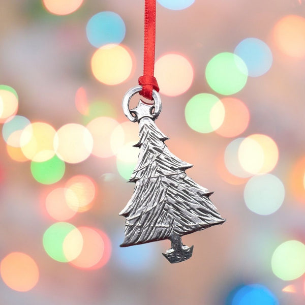 flat christmas tree decoration of a tree with a star on top made of Pewter
