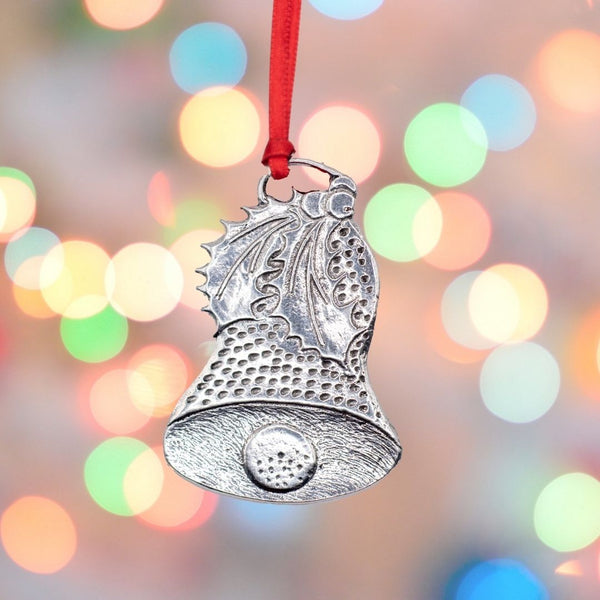 Traditional Christmas bell decoration made of pewter