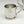 Load image into Gallery viewer, PEWTER METAL BABY CUP WITH SHAMROCK DESIGN. PERFECT AS A BABY GIFT AND EASY TO PERSONALISE. PEWTER IS LOVELY TO ENGRAVE AND THE METAL HOLDS THE SILVER SHINE. PEWTER CUP MADE IN IRELAND
