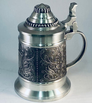 BEER STEIN WITH PAISLEY DESIGN. a GREAT MANS GIFT, BESTMAN, GROOMS MAN, FATHERS DAY OR JUST FOR THE BEER LOVER. THE STEIN IS ALMOST 7" TALL OR 170MM AND HOLDS A PINT OR OVER HALF A LITRE. PEWTER SILVERWARE FINISH