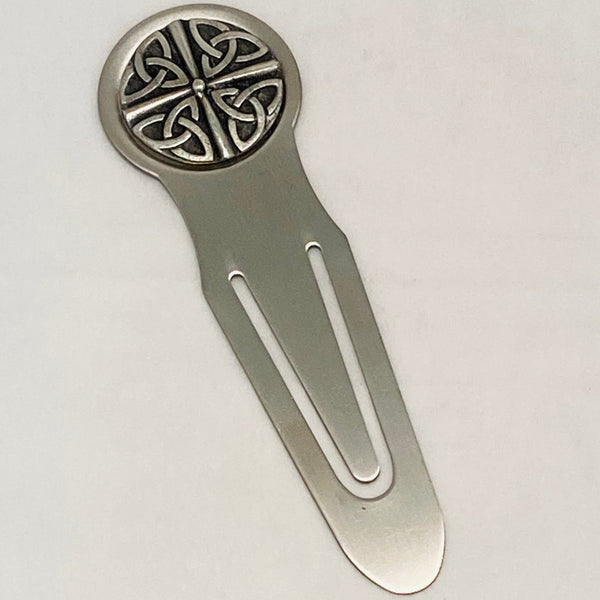 BOOKMARK TRINITY 4 WITHE STAINLESS STEEL METAL AND PEWTER/SILVER DECORATION METAL. tHE TRINITY SHIELD IS MADE UP OF FOUR TRINITY'S AND THE EMBOSSED SHIELD SITS IN PEWTER ON THE TOP OF OUR BOOKMARK THE BOOK MARK IS 5" LONG. IRELAND
