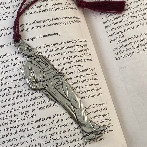 REPLICA OF JAMES JOYCE AS A BOOKMARK WITH Maroon Tassel attached. MADE OF PEWTER METAL IN SILVER FINISH MADE IN IRELAND. 