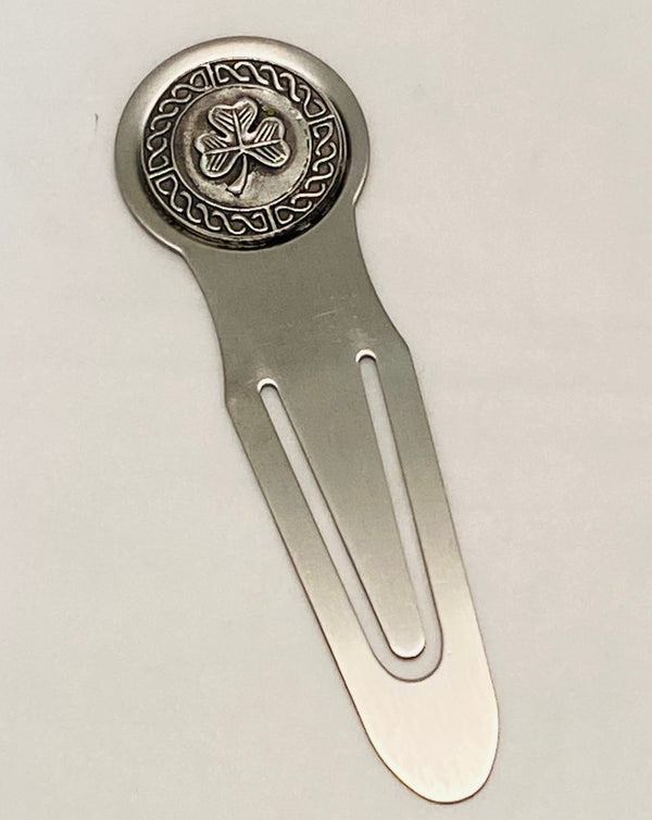 BOOKMARK SHAMROCK STAINLESS STEEL METAL WITH PEWTER/SILVER DECORATION. IRELANDS BEST KNOWN SYMBOL HAS TO BE THE SHAMROCK , HERE EMBOSSED ON TO OUR 5" BOOKMARK.