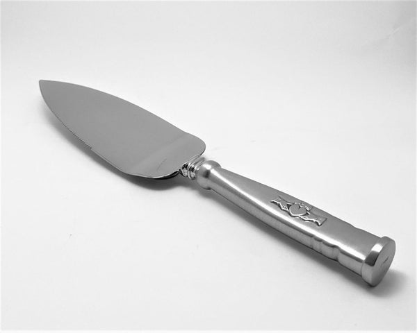 CLADDAGH HANDLED CAKE SERVER. the server makes a great wedding gift or mothers day gift. the handle and blade are cast together and both polished to a silverware finish. The server is 11" long. handmade in Ireland by Mullingar Pewter.
