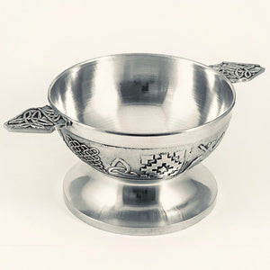 CELTIC QUICH IS FAMOUS THROUGHOUT SCOTLAND AS A WEDDING TOASTING CUP .  THE TWO HANDLED QUICH HAS CELTIC DESIGN ON THE BOWL OF THE CUP AND ON THE  HANDLES. HANDMADE IN IRELAND