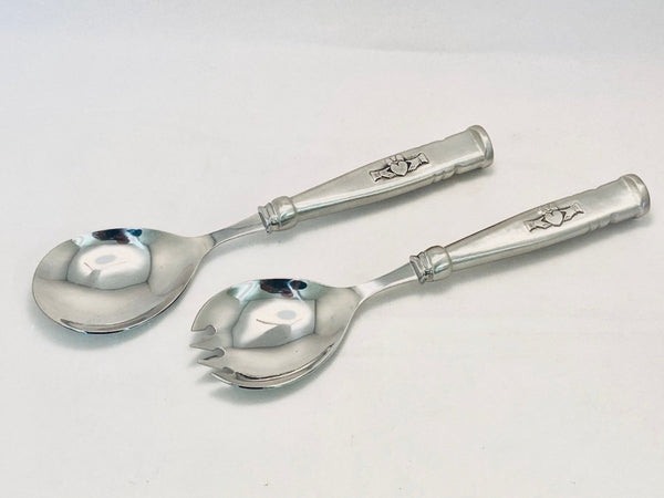 SALAD SERVER SET WITH CLADDAGH HANDLES. PEWTER METAL WITH FINISHED SILVER SHEEN. 9" long each set is also available in Celtic.