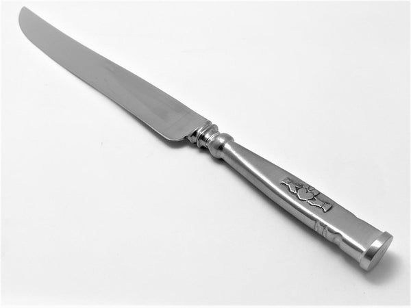 CLADDAGH HANDLED CAKE KNIFE. This makes a great engagement gift or wedding gift. The cake knife is 13" long. the stainless steel blade and the Claddagh design handle are cast together. The knife is polished to a silverware finish.  Handmade in Ireland by Mullingar Pewter