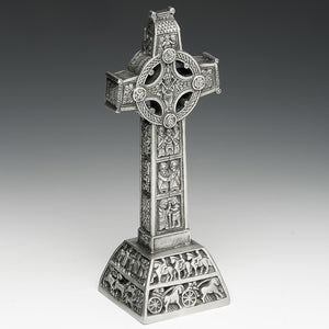 HIGH CROSS FROM CLONMACNOISE, ALSO KNOWN AS THE CROSS OF THE SCRIPTURES. THE CROSS REPLICA IS MADE OF PEWTER AND IS EXACT IN EVERY DETAIL. THE CROSS STANDS AT 7" TALL AND THE ORIGINAL IS APPROX 12 FEET TALL. MADE IN IRELAND BY MULLINGAR PEWTER
