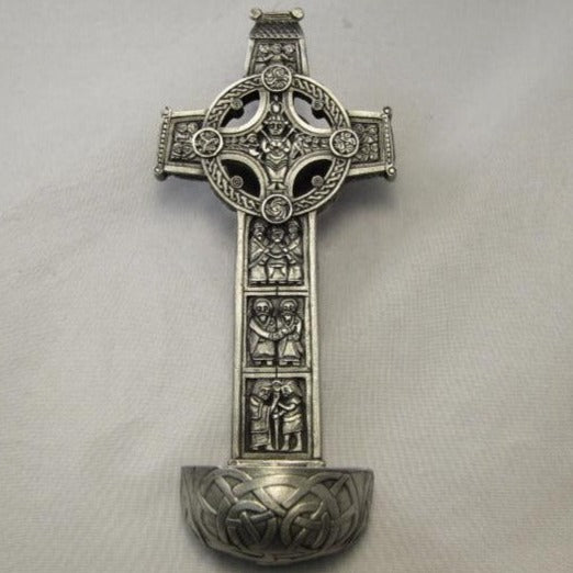 HOLY WATER FONT from the cross of the scriptures in clonmacnoise in Ireland the font is 6 1/2" high and has a hanger on the back for easy hanging. Pewter cast with detailed images as seen on the cross of the scriptures.