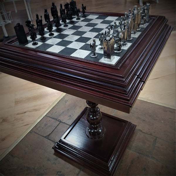 Brian Boru Theme chess set made from Mullingar Pewter and presented on a handcarved Mahogany Chess table with Pewter metal inlay
