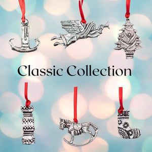 Classic Christmas Collection of Pewter oranments. 6 decorations in total angel, candel, Christmas Tree, Cracker, rocking horse, and socking. 