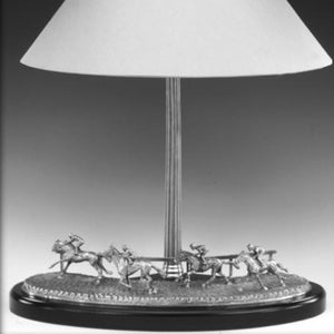 LAMP, RACE HORSES ON FINAL BEND. Ireland is known as the land of the horse and this race horse lamp shows the final bend in any typical Irish race . A great gift for any racehorse  lover. The lamp is 16" wide and 20" tall. Made in Ireland by Mullingar Pewter