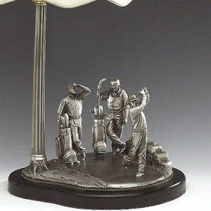 GOLFERS LAMP WITH THREE MEN TEEING OFF. The lamp stands at 22" high (shade  not included) with each figurine approx 7" tall. Great Golf prize. 