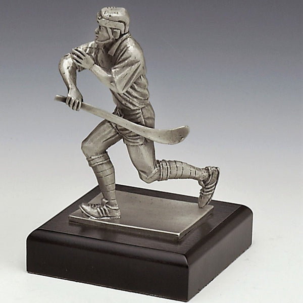 The hurler in full flight. A game played in Ireland with a stick called a hurl and a hard ball called a sliotar. PEWTER 6" TALL