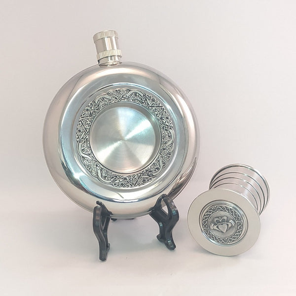 THIS WHISKEY FLASK IS A GREAT POCKET FLASK. IT SITS LOVELY IN THE POCKET AND WITH A PULLOUT CUP IT REALLY ADDS TO THE EXPERIANCE AND ENJOYMENT OF HAVING A LITTLE TIPPLE. PEWTER SILVERWARE STAINLESS STEEL. MADE IN IRELAND