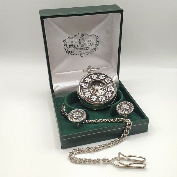 Mullingar Pewter Mechanical Pocket Watch, which opens to reveal the full watch face. Embellished with Pewter decor, shamrocks. Accompanied by pewter shamrock cufflinks. Presented in a Green Gift Box. 
