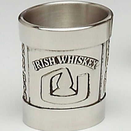 THIS IS AN IRISH WHISKEY MEASURE WITH THE STILL POT ETCHED ON ITS FRONT.  tHE REMAINING SIDES ARE COVERED IN CELTIC KNOTWORK FROM THE BEALIN HIGH CROSS NEAR MULLINGAR IRELAND.