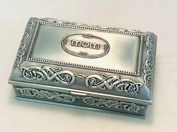 Large jewellery box with celtic design on lid and base. the lid also has a mom symbol with Celtic lace surround, box is 7" long. Pewter Silverware metal polished finish with dark background to contrast. Great bMothers gift.