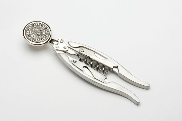 CORKSCREW WITH PEWTER CELTIC TRISCAL SURROUNDED BY CELTIC SQUARE DESIGN. THE 5" LONG CORKSCREW IS BOTH ELEGANT AND STURDY. gREAT TO OPEN A NICE BOTTLE OF WINE WHEN CELIBRATIN. MADE IN IRELAND BY MULLINGAR PEWTER
