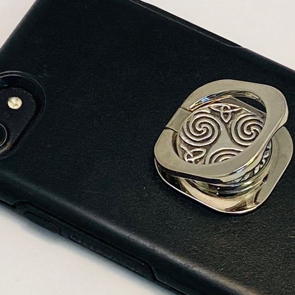 POP SOCKET PHONE HOLDERS. fixed to the back of a phone. just peel and stick. its that simple.
