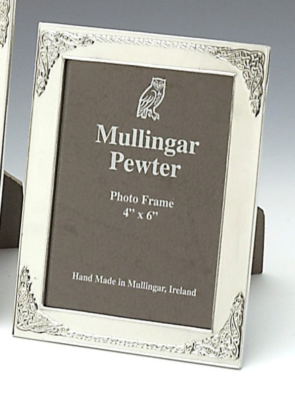 4 X 6 KELLS PICTURE FRAME IN A LOVELY SOFT SILVER FINISH. THE FRAME IS MADE OF PEWTER AND IS CAST IN MULLINGAR IRELAND. THE DESIGN IS INSPIRED BY BOOKS OF DURROW AND KELLS AND THE MANY HIGH CROSSES FOUND AROUND IRELAND.  THIS MAKES A GREAT GIFT AND REALLY LOOKS LOVELY WHEN PRESENTED WITH A BEAUTIFUL PHOTO. PEWTER SILVERWARE POLISHED FINISH